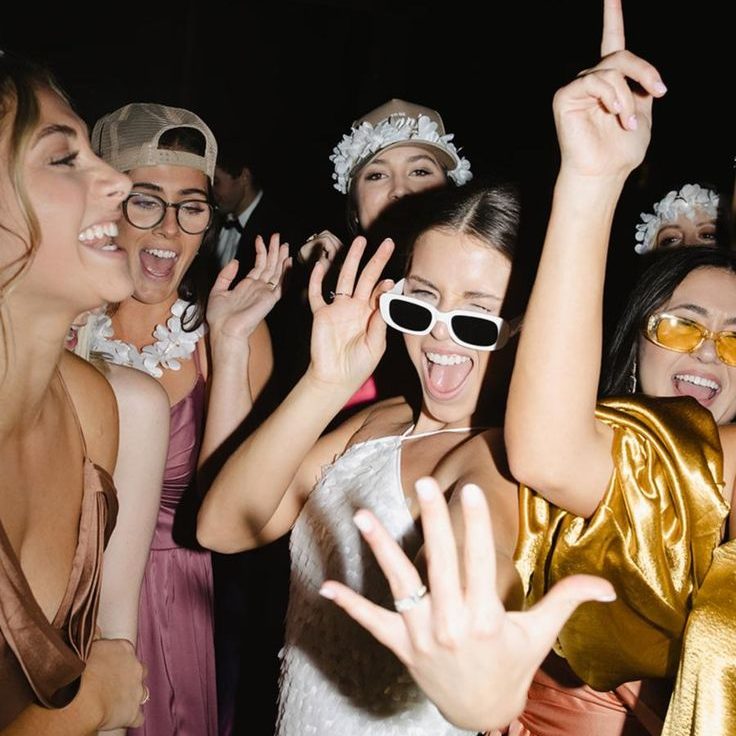 bride dancing with her girls to an incredible dj at her wedding.