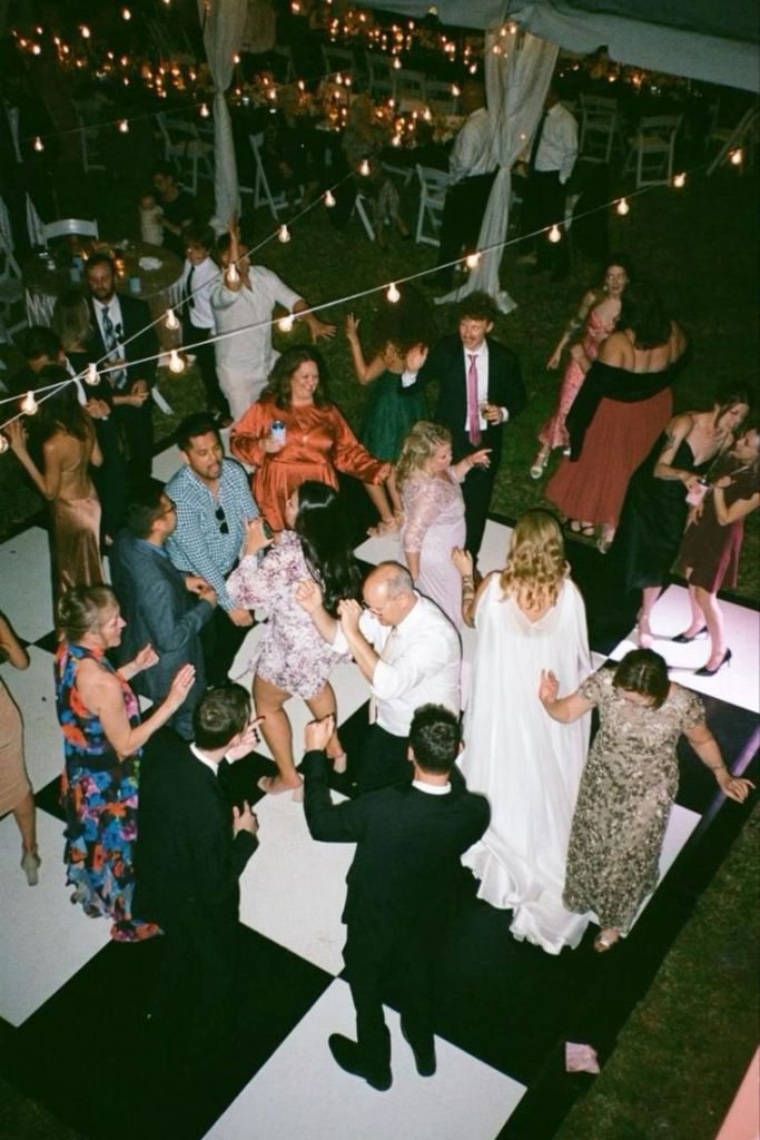 family and friends at a wedding dancing to the fantastic dj's music, wedding dj near dallas texas, fort worth texas, wedding planner