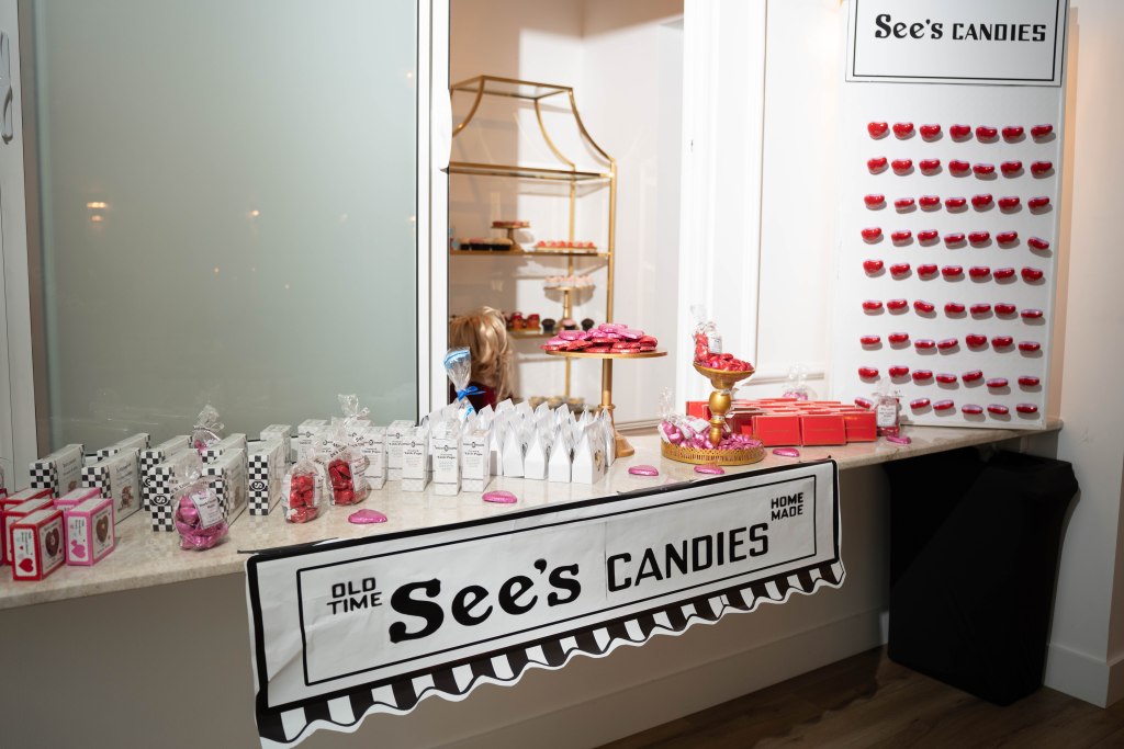 Custom See’s Candies bar at luxury Valentine’s Day wedding reception