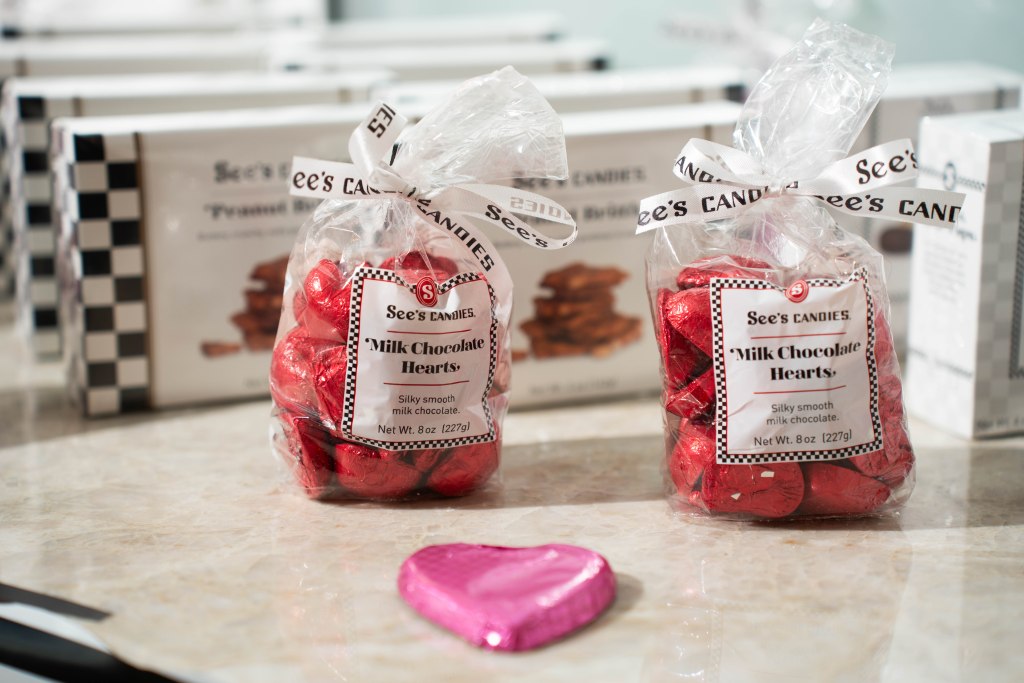 See’s Candies milk chocolate hearts displayed at the wedding dessert station
