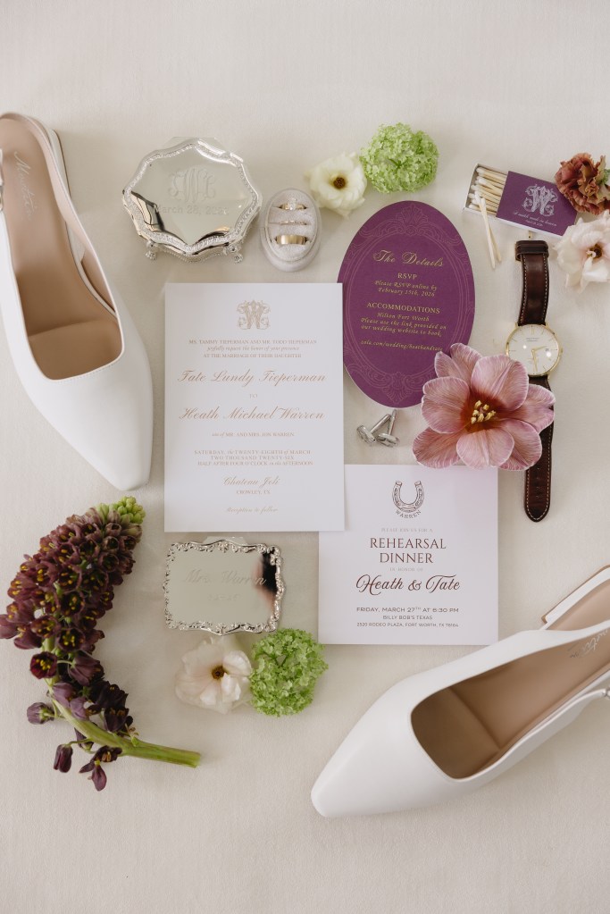 Wedding flat lay featuring invitation suite, bridal shoes, florals, jewelry, and elegant wedding detail styling in soft romantic tones.